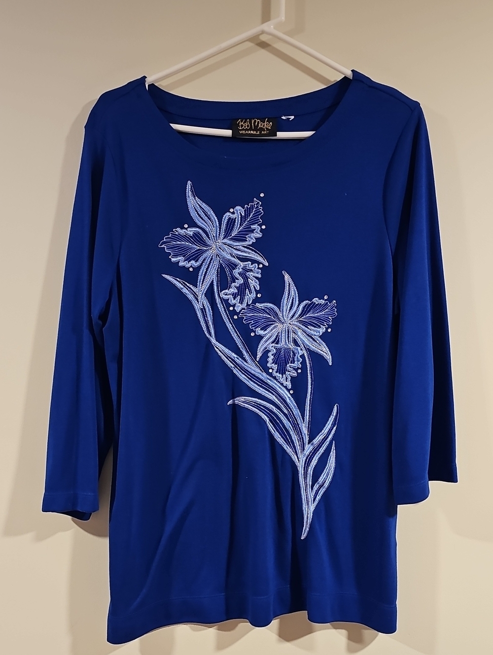 Bob Mackie Royal Blue Long-Sleeve Top with White Floral Embroidery. Ptp 23.
